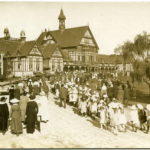 Boy Scouts and Girl Peace Scouts march at Bath House Building